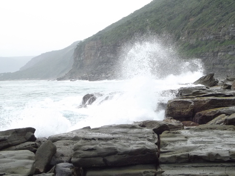 Waves breaking on rocks